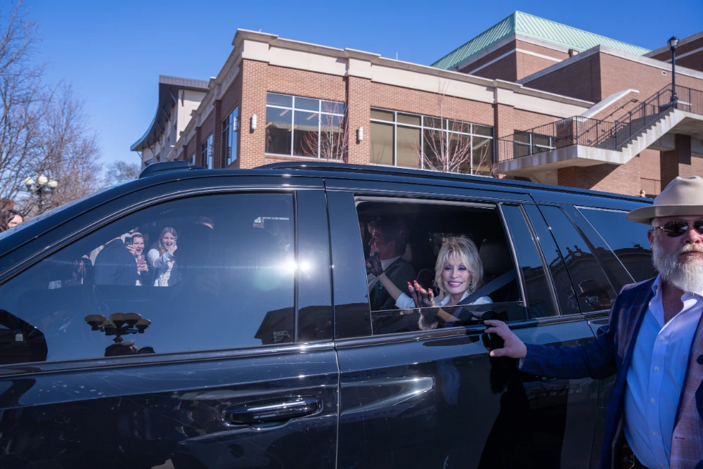 Dolly in car leaving Belmont's Fisher Center
