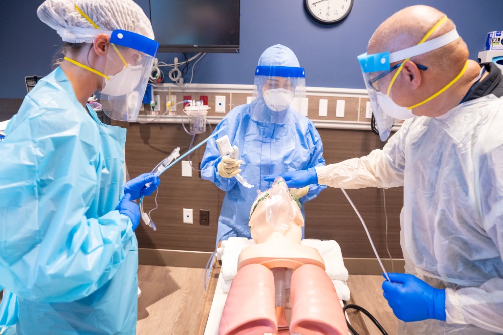 Simulation participants practice intubation