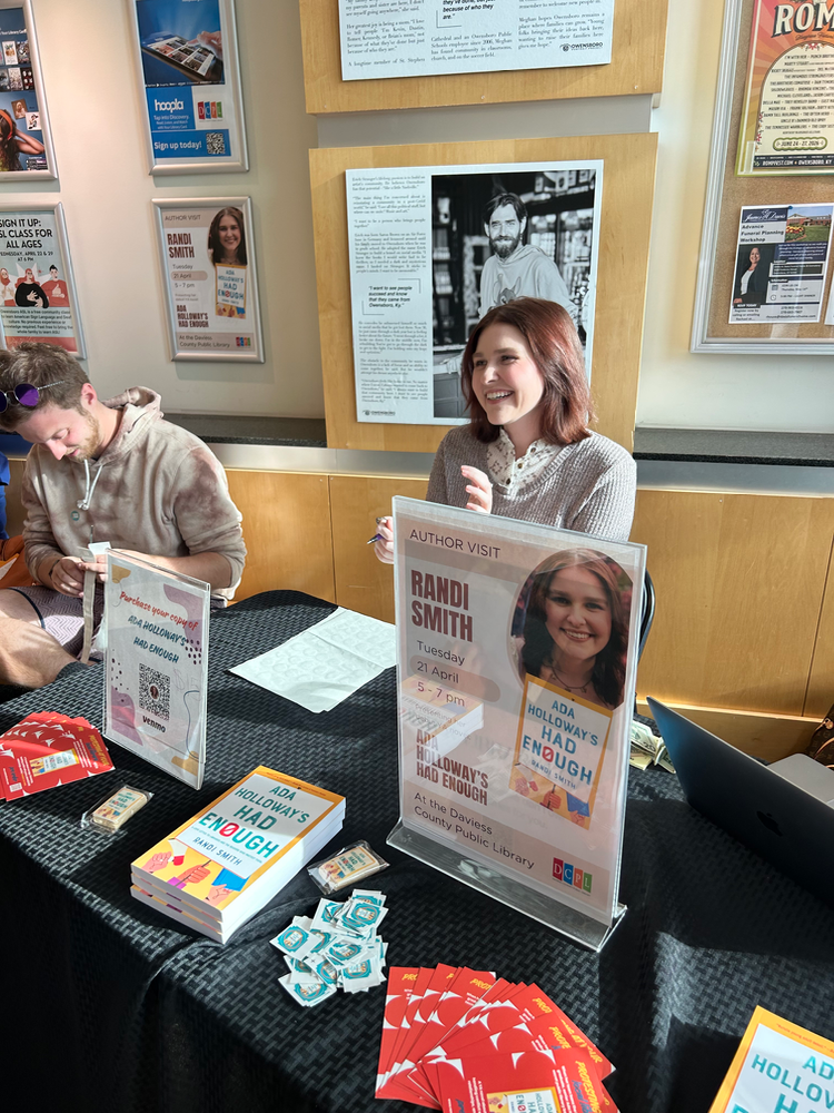 Randi Smith, author of "Ada Holloway's Had Enough," smiles at an author visit or book signing event.