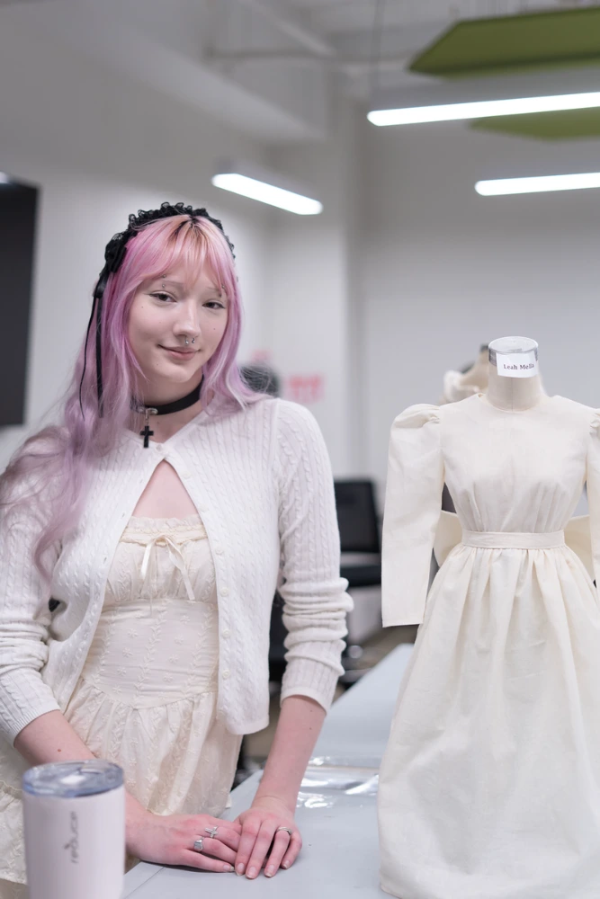 Mella poses with dress