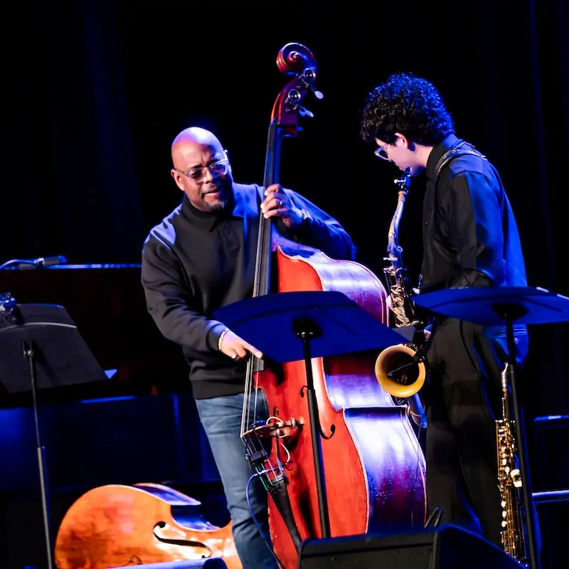 Christian McBride performs with students
