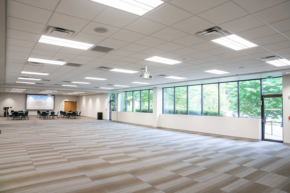 Gabhart A&B set up with a few chairs and round tables, but mostly empty