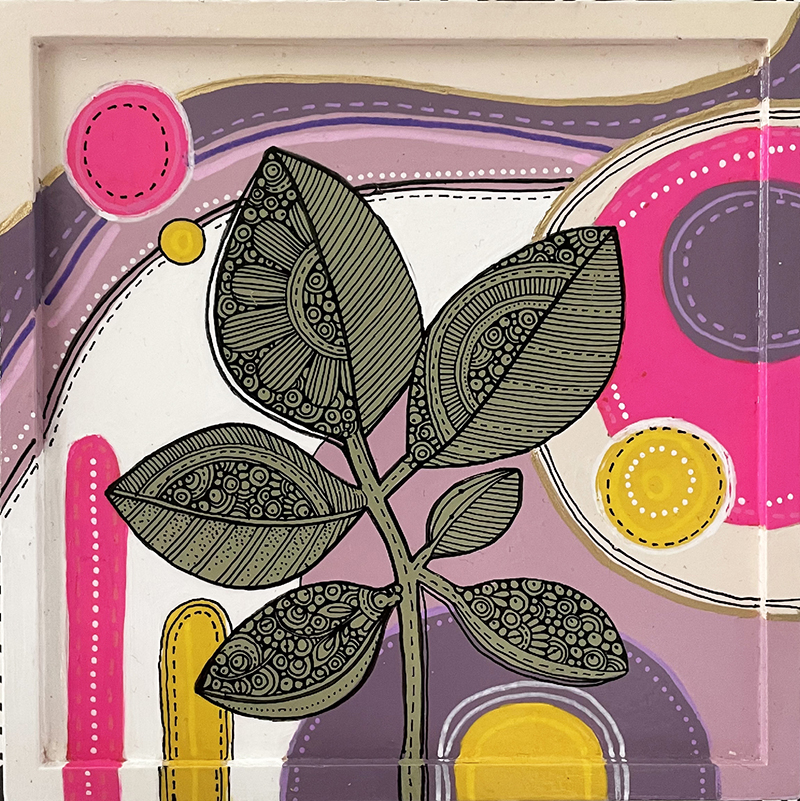 Image of a black flower with patterns on it, set agains colorful block shapes in the background